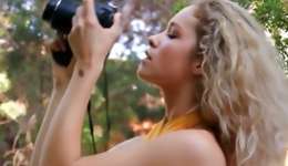 Natural blonde marvelous bitch is posing a forest with nude cute body