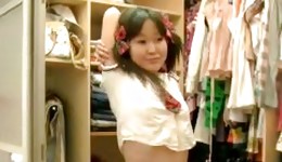 Japanese infant lass is playing sexually with a gigantic marital-device and looks seductive